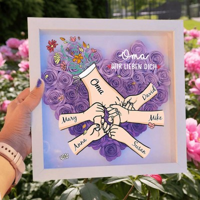 Personalisierte Blumen-Schattenbox mit der Aufschrift „Wir lieben dich, Oma hält Hände“ und den Namen der Enkelkinder für Oma und Mama, einzigartiges Muttertagsgeschenk